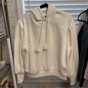 Express balloon sleeve drawstring tassel hooded sweatshirt
